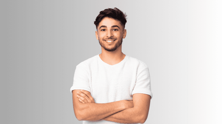 Young man smiling with teeth showing